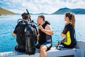 a scuba instructor with a student