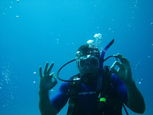 A Scuba diver with a scuba diving mask