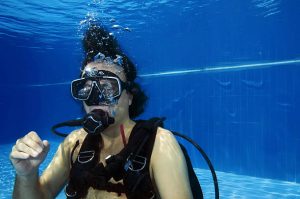 A scuba diver with a fittable mask