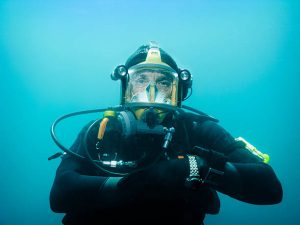 A scuba diver wearing BC jacket