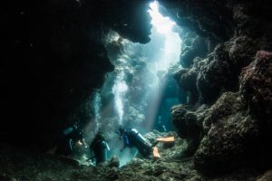 3 scuba divers underwater