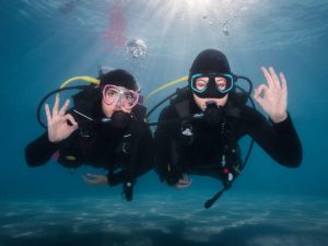 Two scuba divers underwater