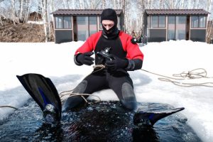 a scuba diver wearing a drysuit