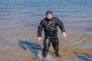 a scuba diver wearing a membrane drysuit