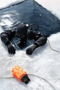 a scuba diver wearing a drysuit