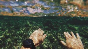 a diver wearing a dive watch