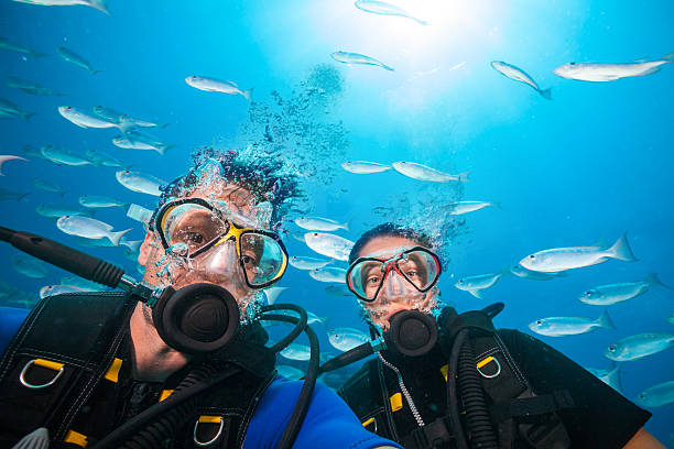 two couple scuba divers