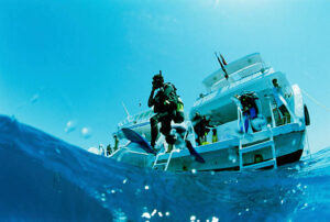 A scuba diver on aboat